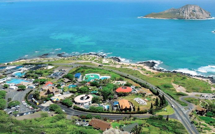 Aerial view of Sea Life Park Hawaii with ocean and island in the background.