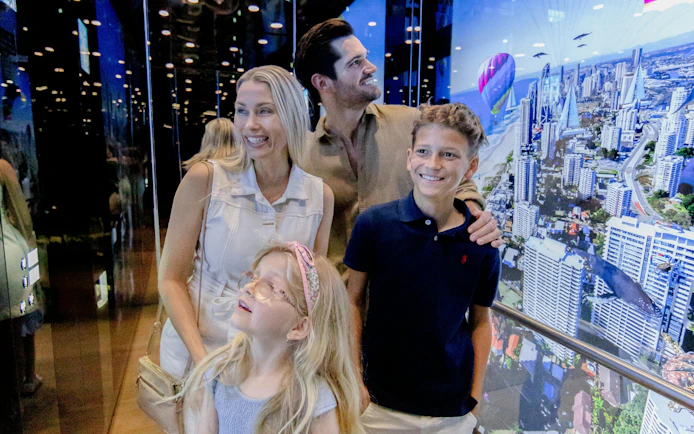 Family enjoying the view at SkyPoint Observation Deck, Gold Coast.