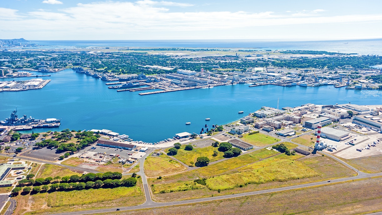 Aerial view of Pearl Harbor, showing naval base and surrounding landscape in Honolulu, Hawaii.