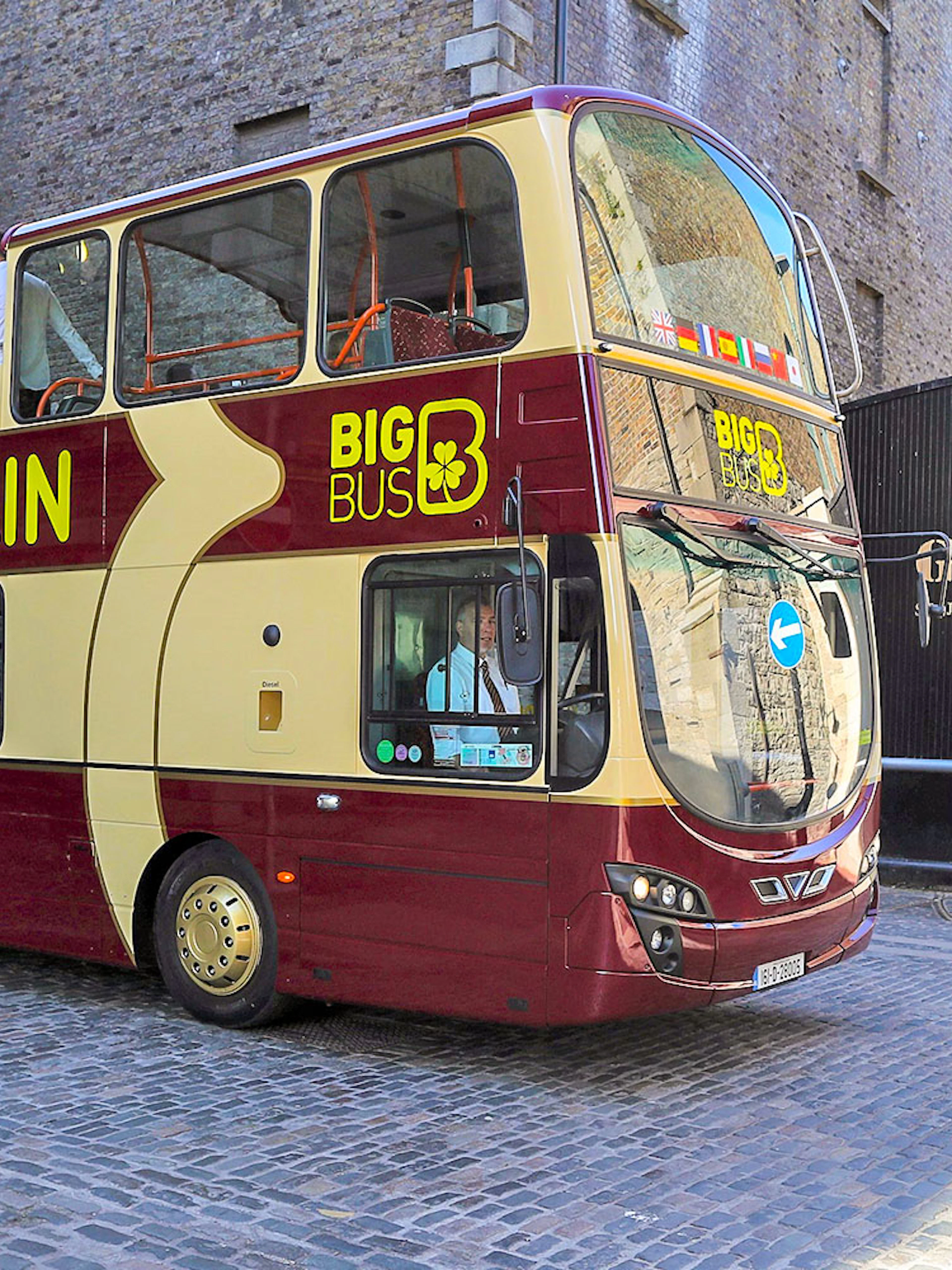 Big Bus tour passing Guinness Storehouse in Dublin.