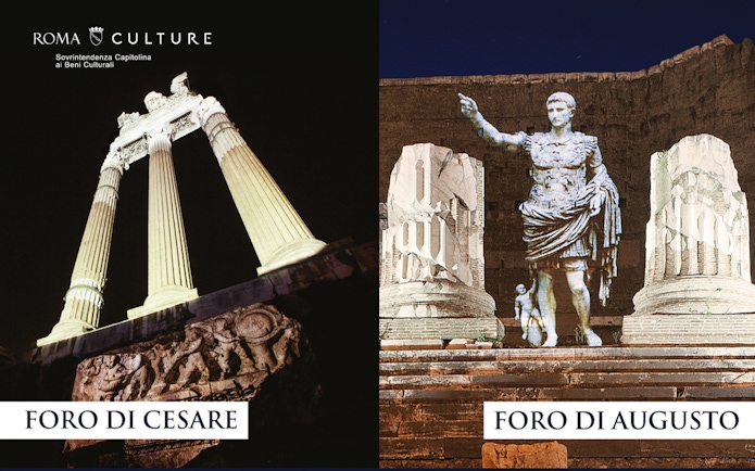 Foro di Cesare and Foro di Augusto illuminated at night in Rome.