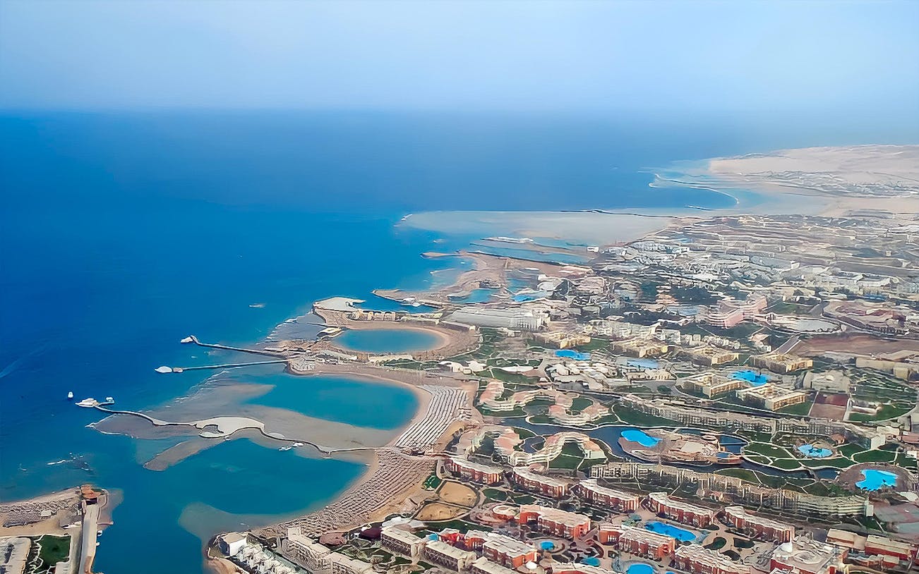 Aerial view of Hurghada coastline with resorts and beaches, Egypt.