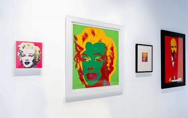 Andy Warhol pop art pieces displayed at The Glam Factory, Dubai exhibit.