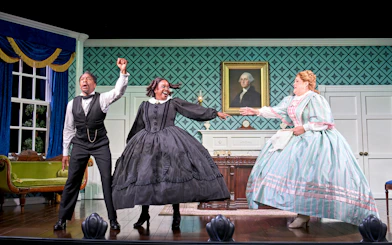 Actors performing a lively scene in "Oh Mary" at a West End theater.
