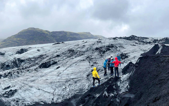 Guests hiking on Sólheimajökull Glacier in Iceland.