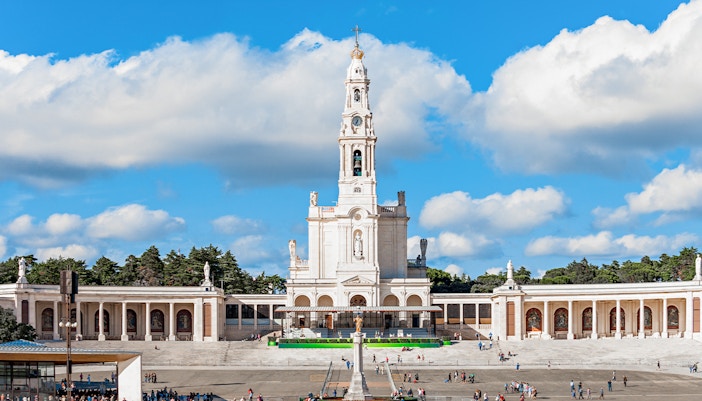 Sanctuary of Fatima with pilgrims gathered in the main square, Portugal.