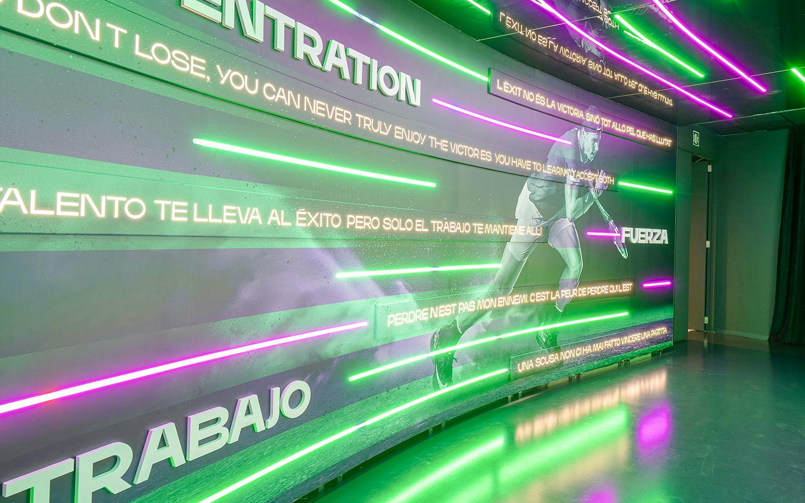 Rafa Nadal Museum interior with motivational quotes and tennis imagery.