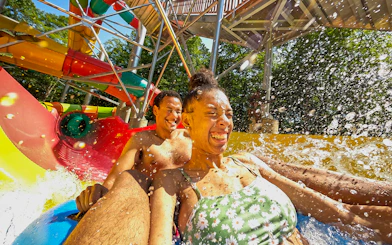 Visitors enjoying a water slide at Busch Gardens Williamsburg.