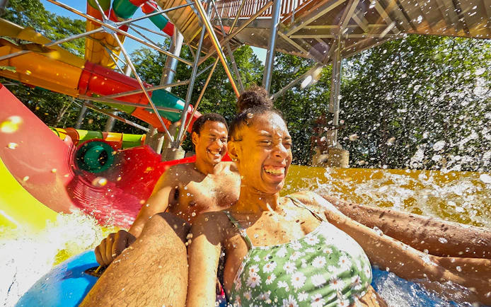 Visitors enjoying a water slide at Busch Gardens Williamsburg.