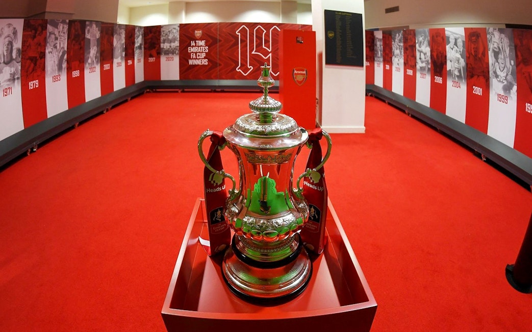 FA Cup trophy in Arsenal FC Emirates Stadium locker room, London.