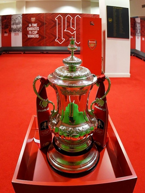FA Cup trophy in Arsenal FC Emirates Stadium locker room, London.