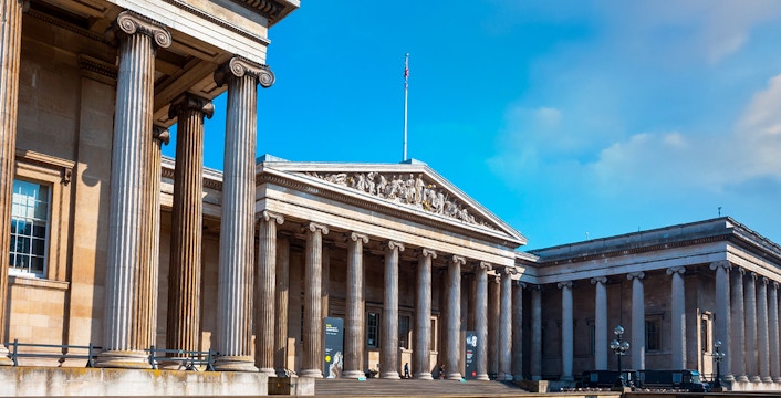 British Museum's neoclassical facade with columns in London, UK.