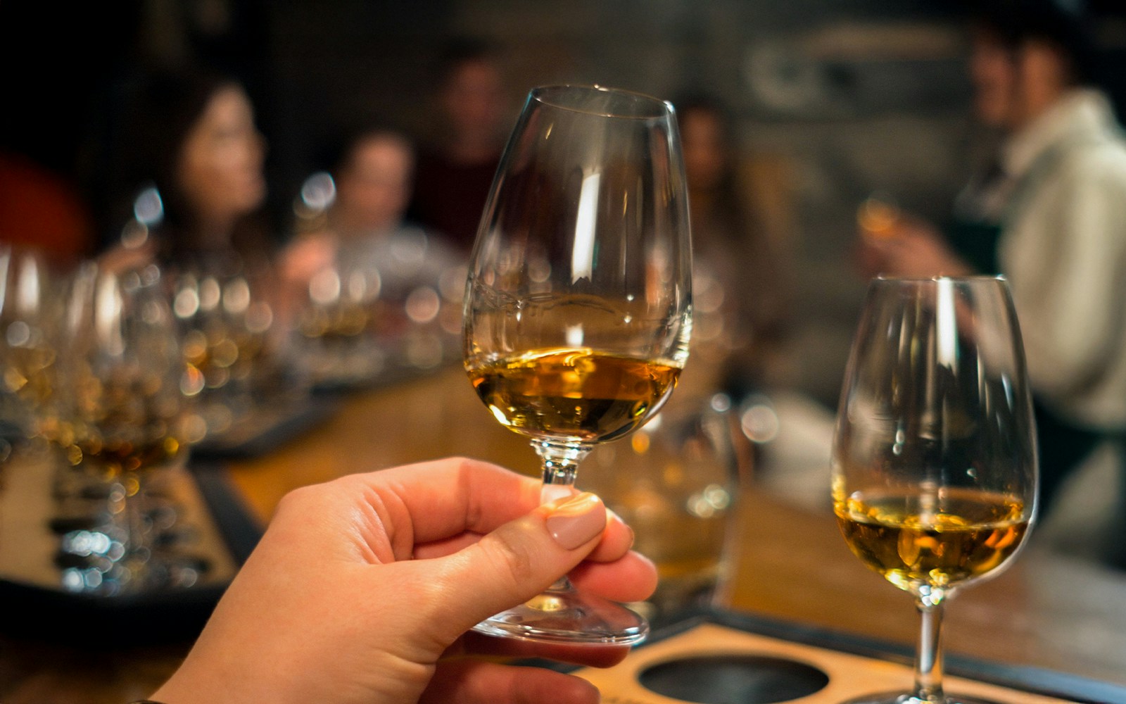 Jameson Distillery whiskey tasting setup with glasses and bottles in Dublin.