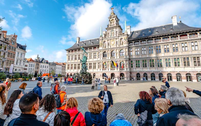 Tour group in front of Antwerp City Hall in Grote Markt, Antwerp, Belgium.