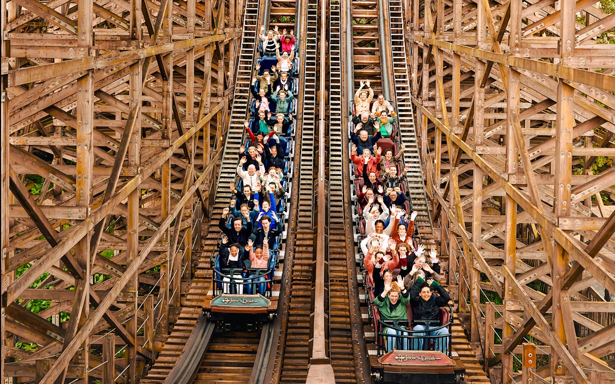 Visitors on a wooden rollercoaster at Efteling Theme Park, Netherlands.