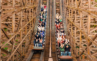 Visitors on a wooden rollercoaster at Efteling Theme Park, Netherlands.