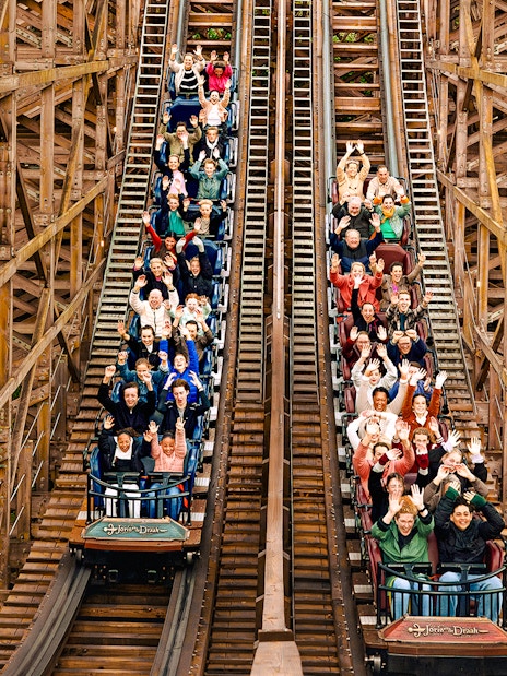 Visitors on a wooden rollercoaster at Efteling Theme Park, Netherlands.