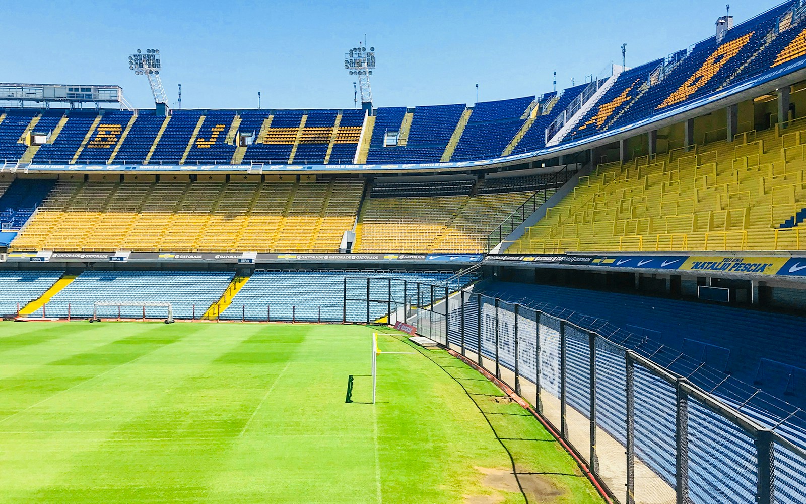 Boca Junior Stadium in Buenos Aires with vibrant blue and yellow seating.