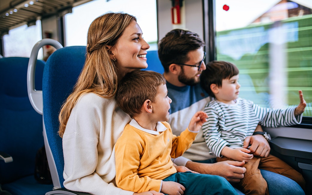 Family enjoying train ride to Harry Potter Warner Bros. Studio tour.