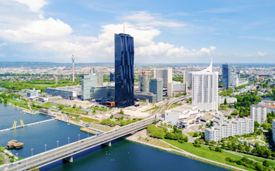 Vienna skyline with DC Tower I and Danube River, Austria.