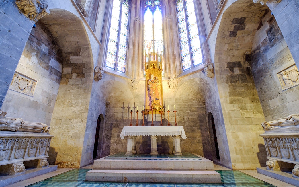 Altar and stained glass windows inside Palma Cathedral, Mallorca.
