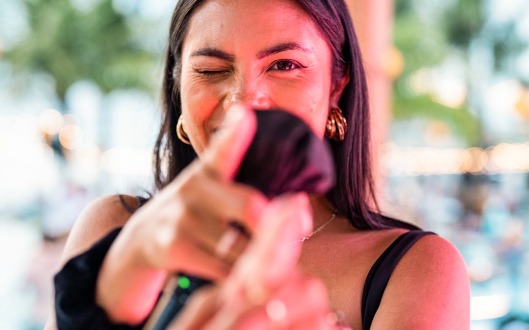 Guest enjoying vibrant atmosphere at Finns Beach Club Bali.