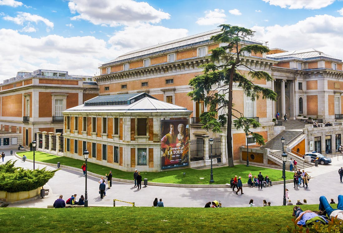 Prado Museum facade in Madrid showcasing intricate architectural details.