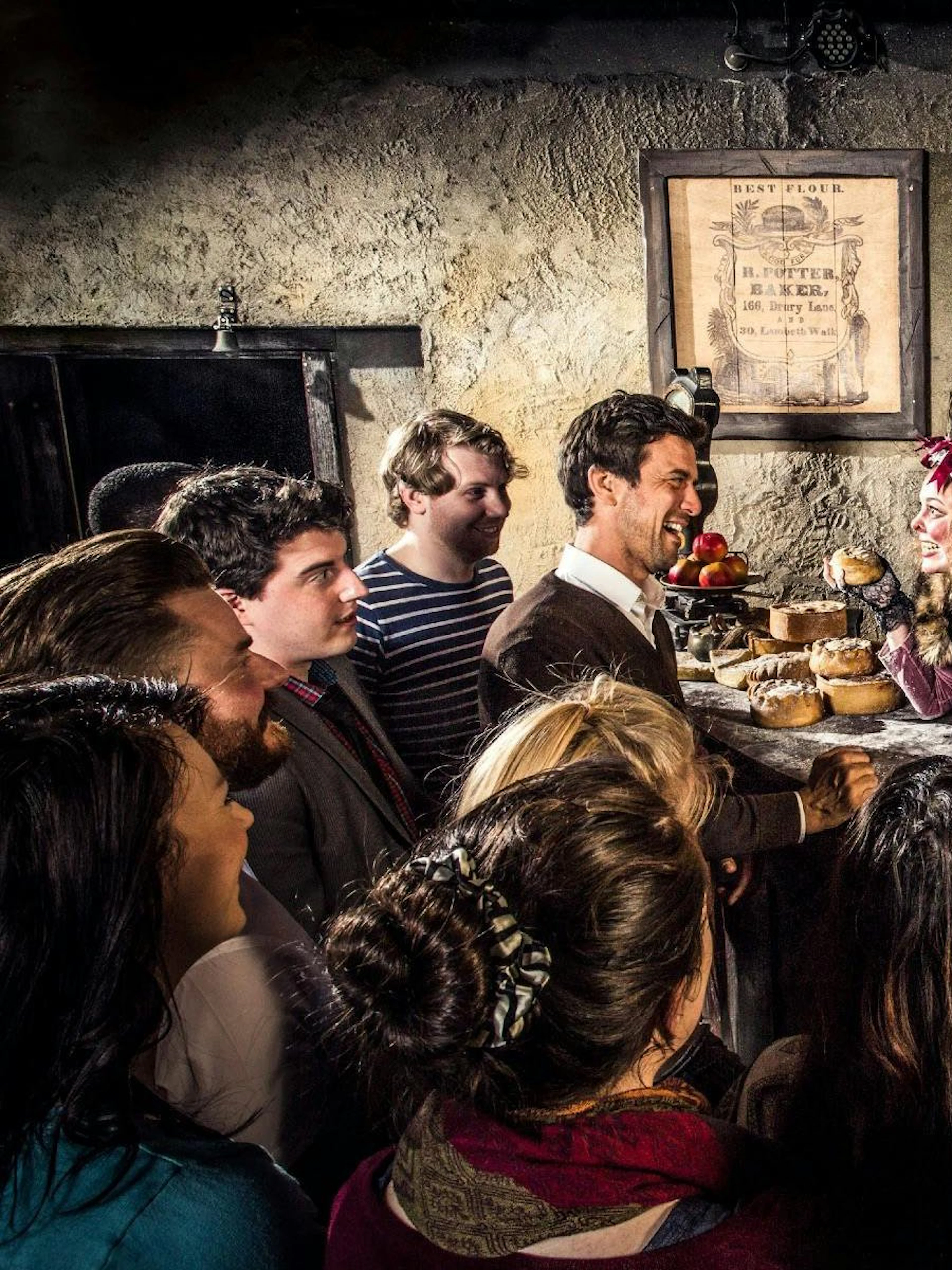 Guests interacting with a performer at the London Dungeon VIP Package experience.