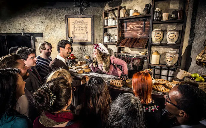 Guests interacting with a performer at the London Dungeon VIP Package experience.