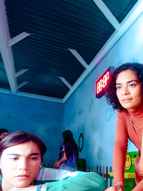 Participants engaging in a Squid Game-themed challenge at the London experience.