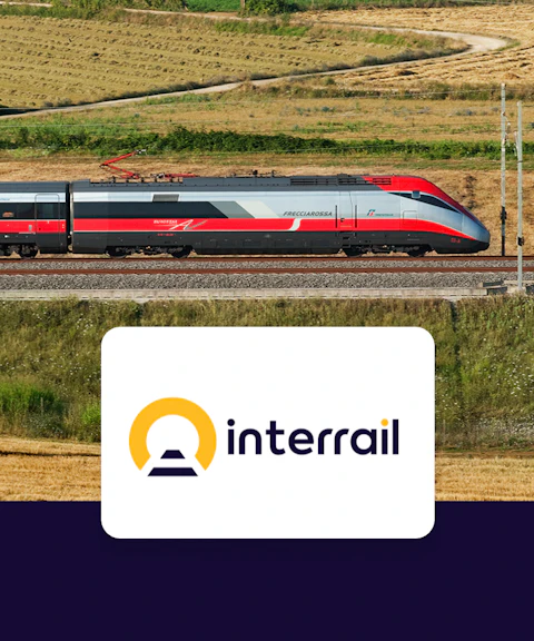High-speed train traveling through countryside fields, Interrail Global Continuous Pass.