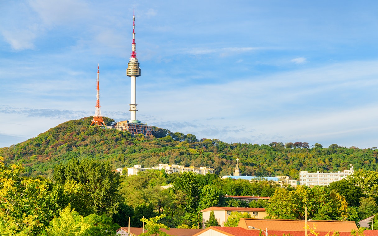 Namsan Seoul Tower on a green hill in Seoul, South Korea.