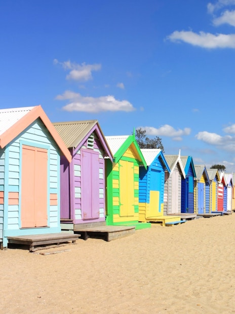 Colorful beach huts at Brighton Beach, Melbourne, part of Puffing Billy Steam Train & Penguin Parade Day Tour.