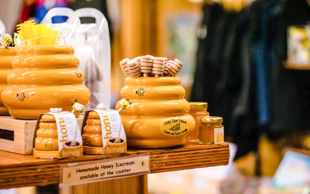 Cliffords Honey Farm shop display with honey jars and dippers, Kangaroo Island, Australia.