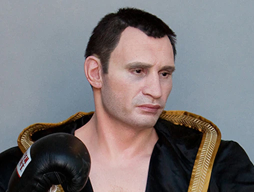 Boxer wax figure in black robe at Panoptikum.