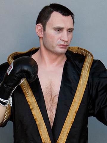 Boxer wax figure in black robe at Panoptikum.