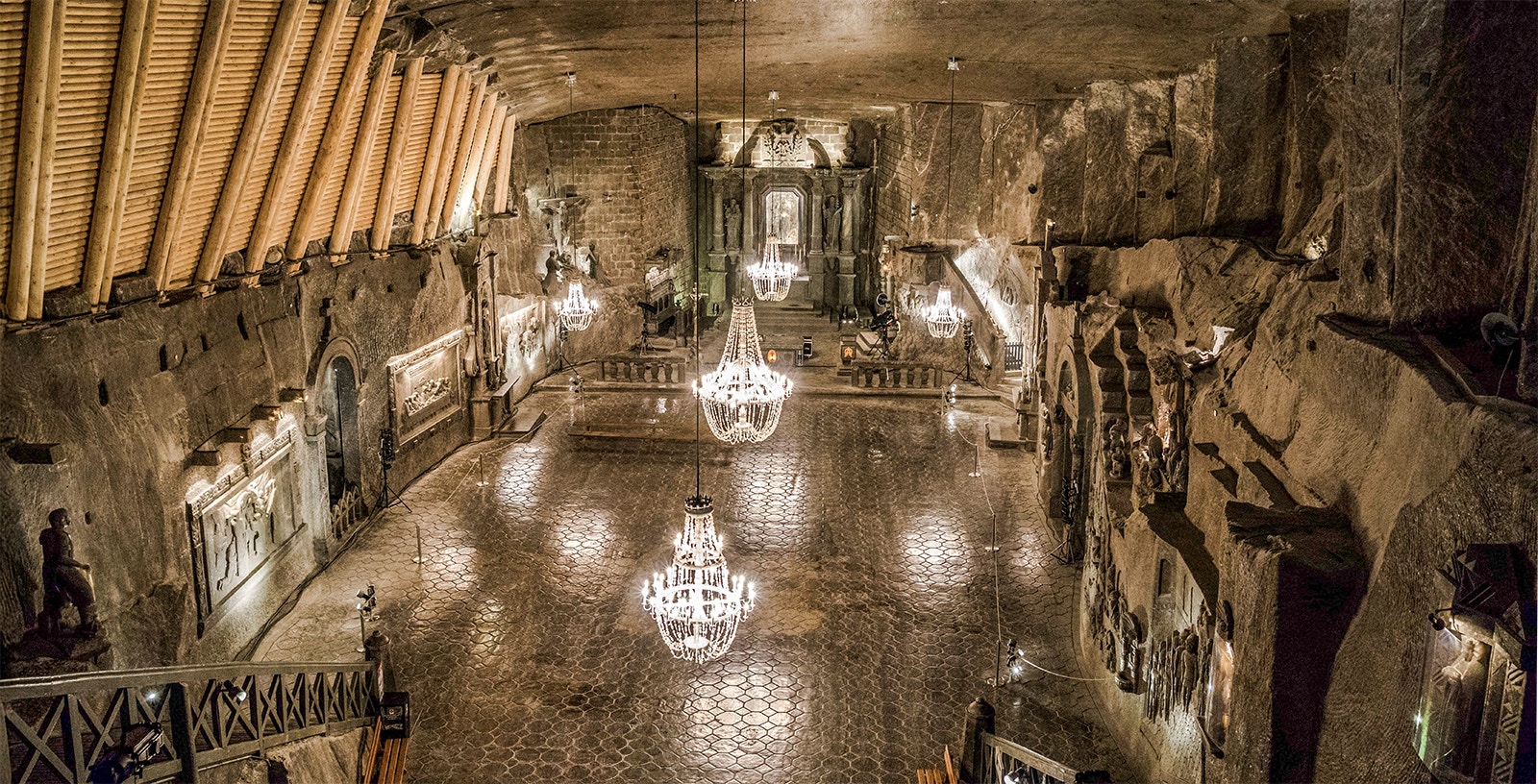 St. Kinga's Chapel in Wieliczka Salt Mine with chandeliers and salt carvings.