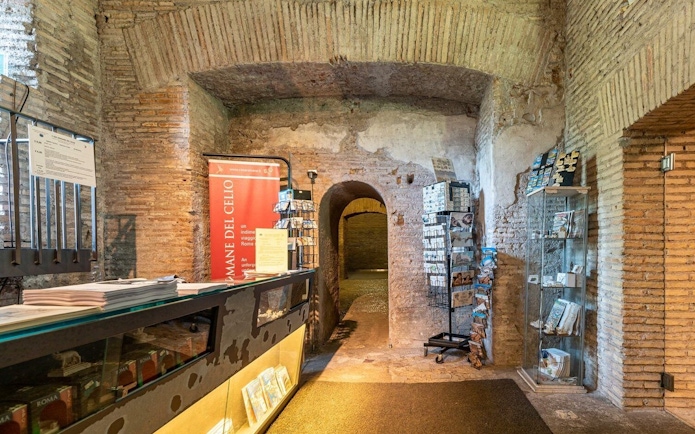 Entrance area of Roman Houses of the Celio Hill Underground with brochures and displays.