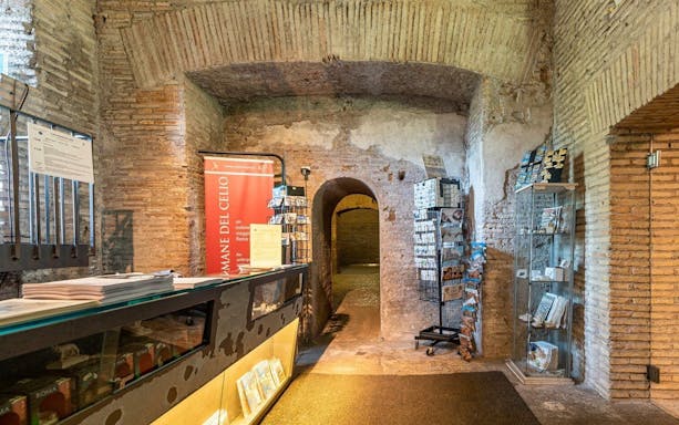Entrance area of Roman Houses of the Celio Hill Underground with brochures and displays.