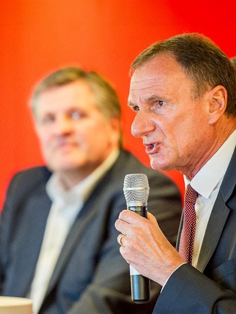 Former Liverpool FC player speaking at a Q&A session during the stadium tour.