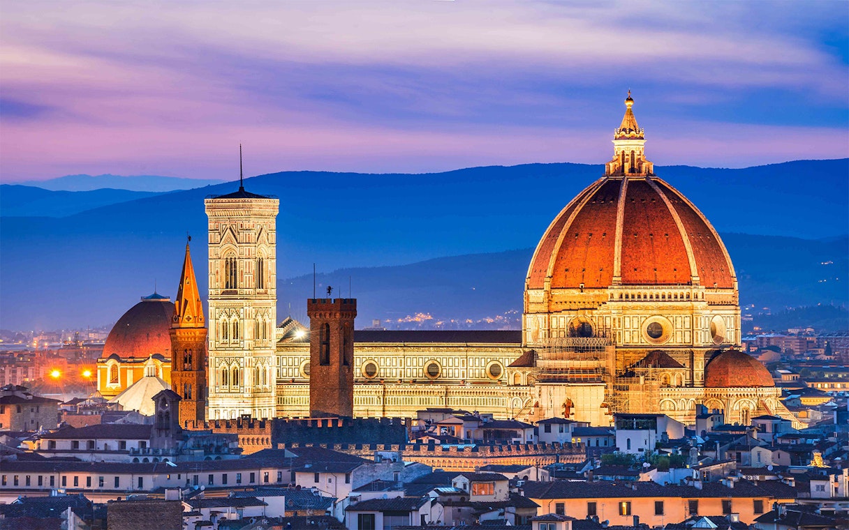 Accademia Gallery and Florence Duomo at sunset, Florence, Italy.