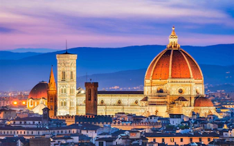 Accademia Gallery and Florence Duomo at sunset, Florence, Italy.
