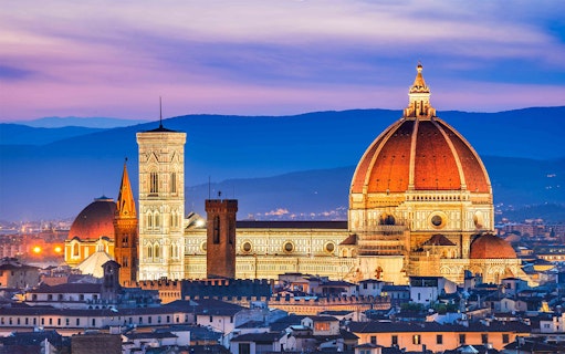 Accademia Gallery and Florence Duomo at sunset, Florence, Italy.