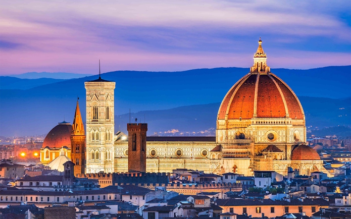 Accademia Gallery and Florence Duomo at sunset, Florence, Italy.