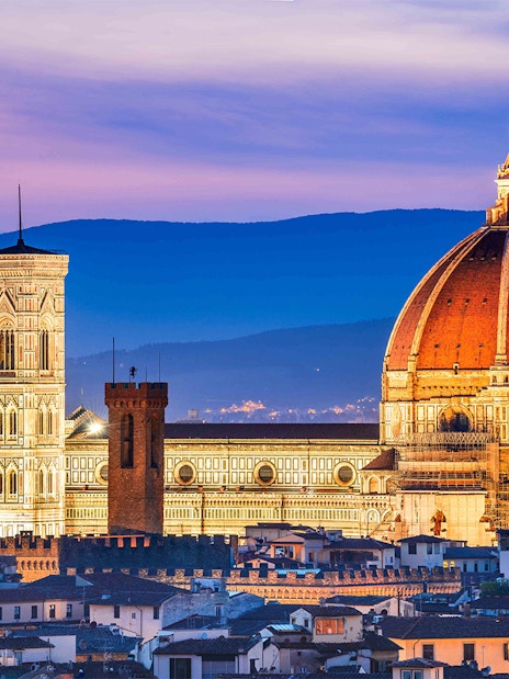 Accademia Gallery and Florence Duomo at sunset, Florence, Italy.