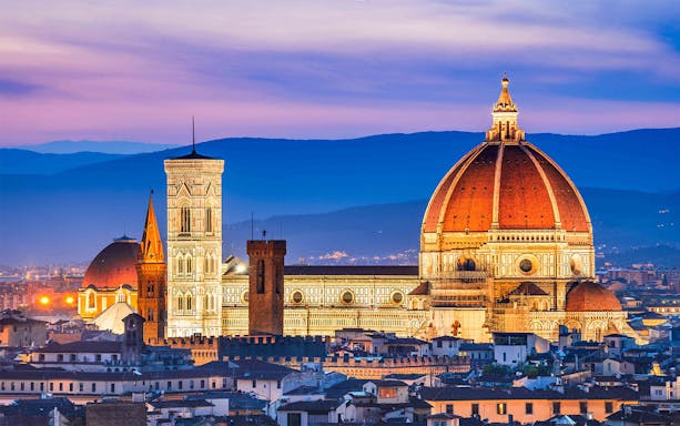 Accademia Gallery and Florence Duomo at sunset, Florence, Italy.