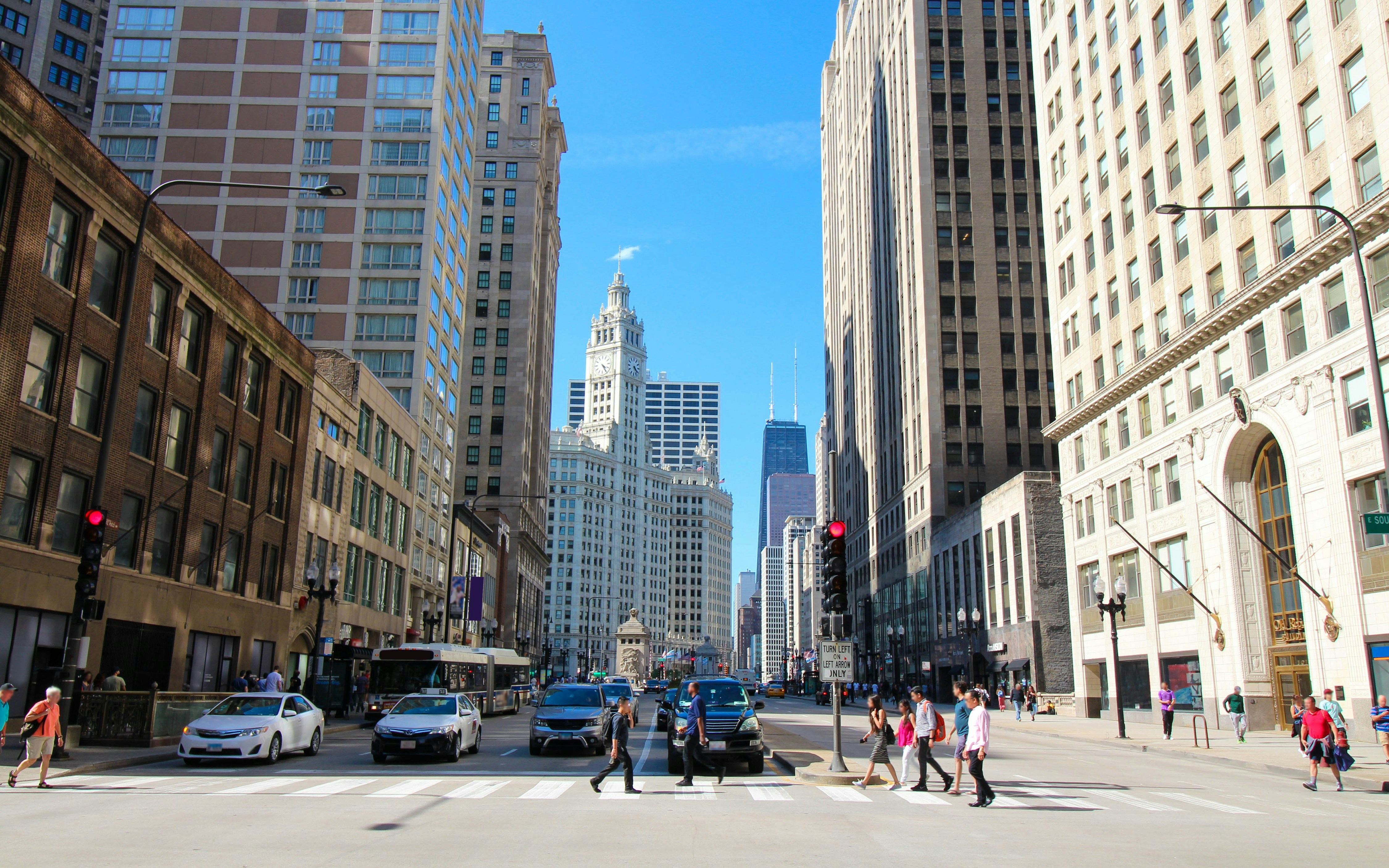 People crossing the street at Magnificent Mile , Chicago