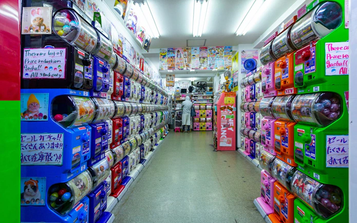 Gachapon machines in Akihabara shop, Tokyo, part of anime and gaming walking tour.
