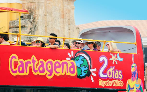 People on upper deck of City Sightseeing bus in Cartagena.