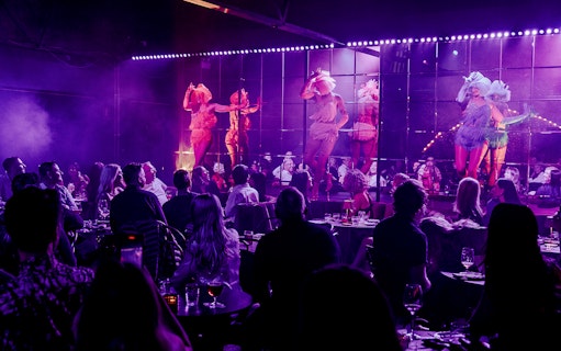 Cabaret performance at The Emerald Room with audience enjoying the show.
